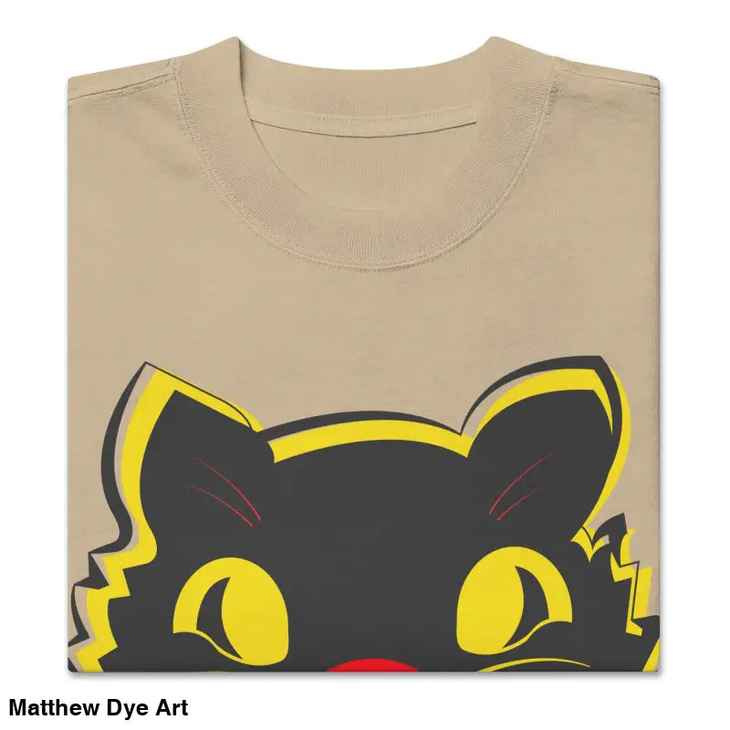 Folded vintage cat oversized faded t-shirt featuring a whimsical cat graphic