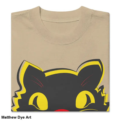 Folded vintage cat oversized faded t-shirt featuring a whimsical cat graphic
