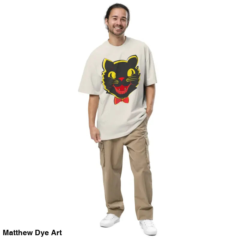 Man in a Grinning Ghoul vintage cat oversized faded t-shirt and cargo pants
