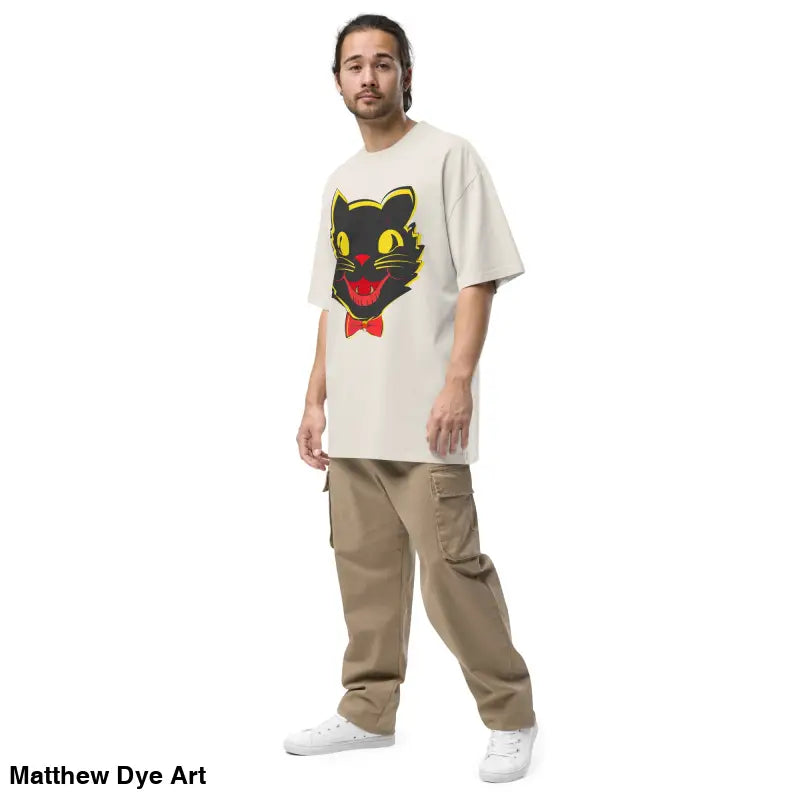 Man showcasing the Grinning Ghoul Vintage Halloween Oversized Tee with cargo pants