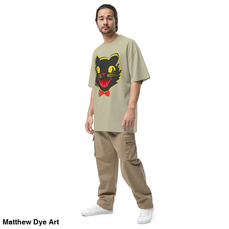 Man modeling a Vintage Halloween Oversized Tee featuring a cat graphic design