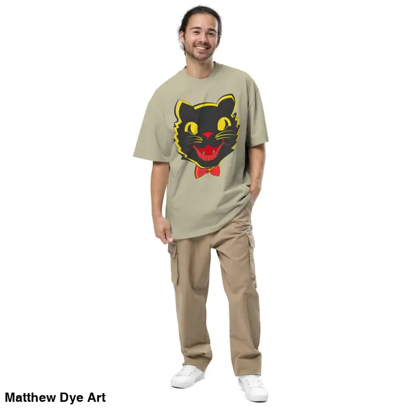 Man in a Grinning Ghoul vintage cat oversized faded t-shirt and cargo pants