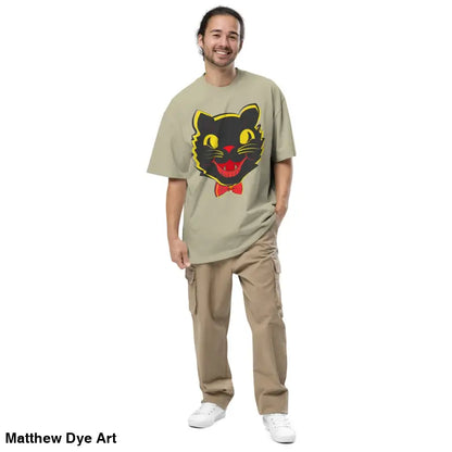Man in a Grinning Ghoul vintage cat oversized faded t-shirt and cargo pants