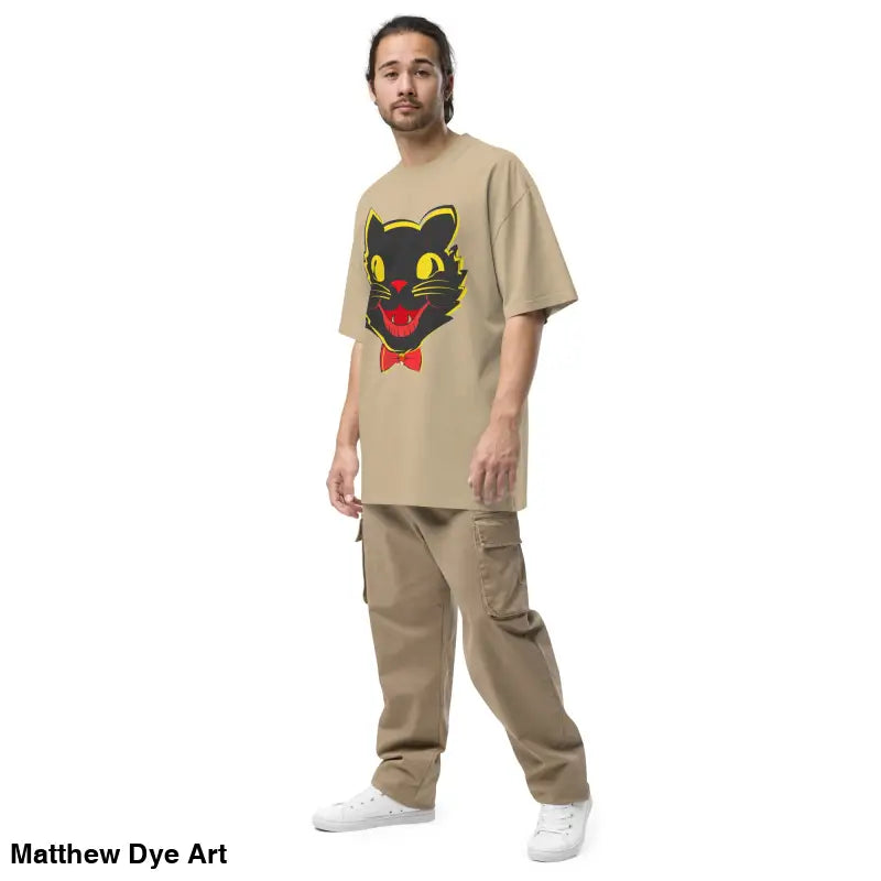 Tan t-shirt featuring black cat graphic from Grinning Ghoul Vintage Halloween Oversized Tee