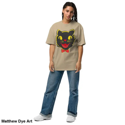 Woman modeling a vintage cat oversized faded t-shirt featuring a black cat graphic