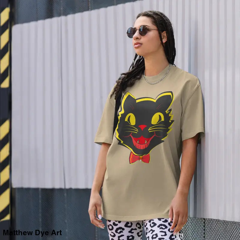 Woman’s tan vintage cat oversized t-shirt featuring a black cat graphic for Halloween