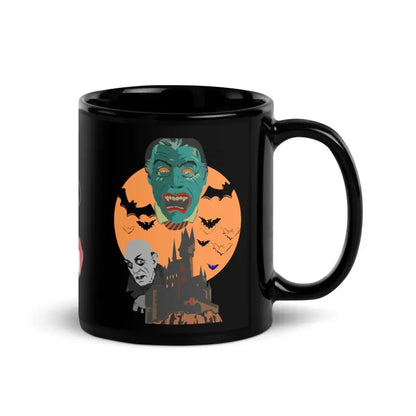 Black ceramic mug by Matthew Dye Art featuring vintage monster faces and bats on an orange moon