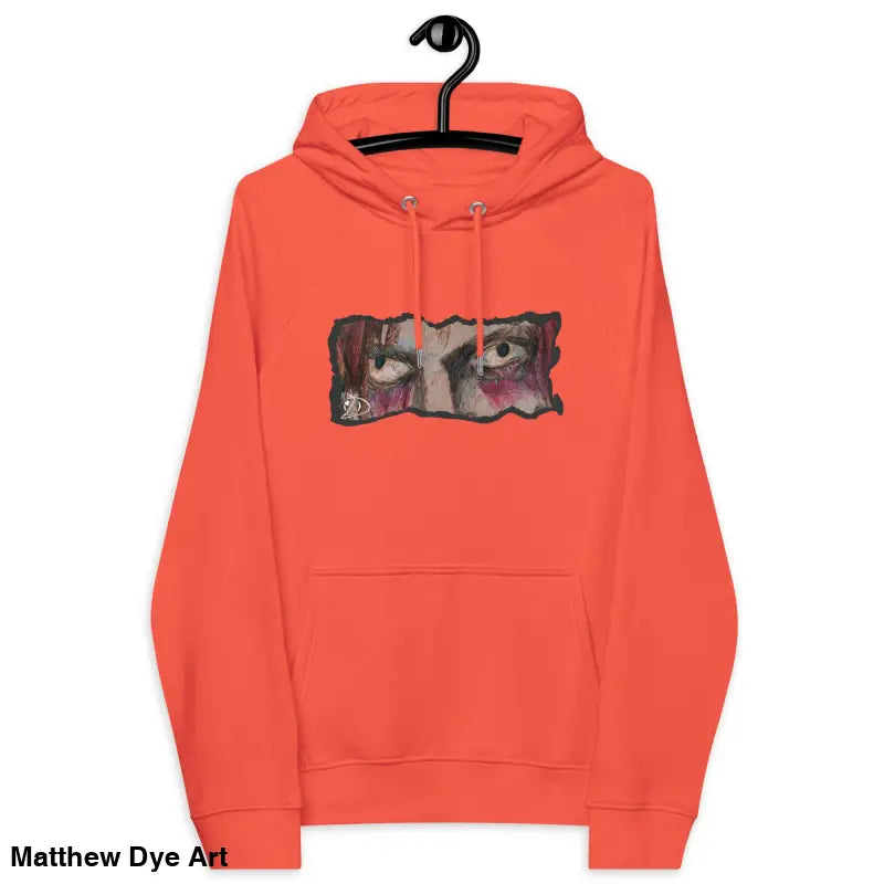 Orange Haunted Gaze Unisex Eco Raglan Hoodie featuring an eye graphic for eerie style