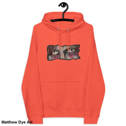 Orange Haunted Gaze Unisex Eco Raglan Hoodie featuring an eye graphic for eerie style