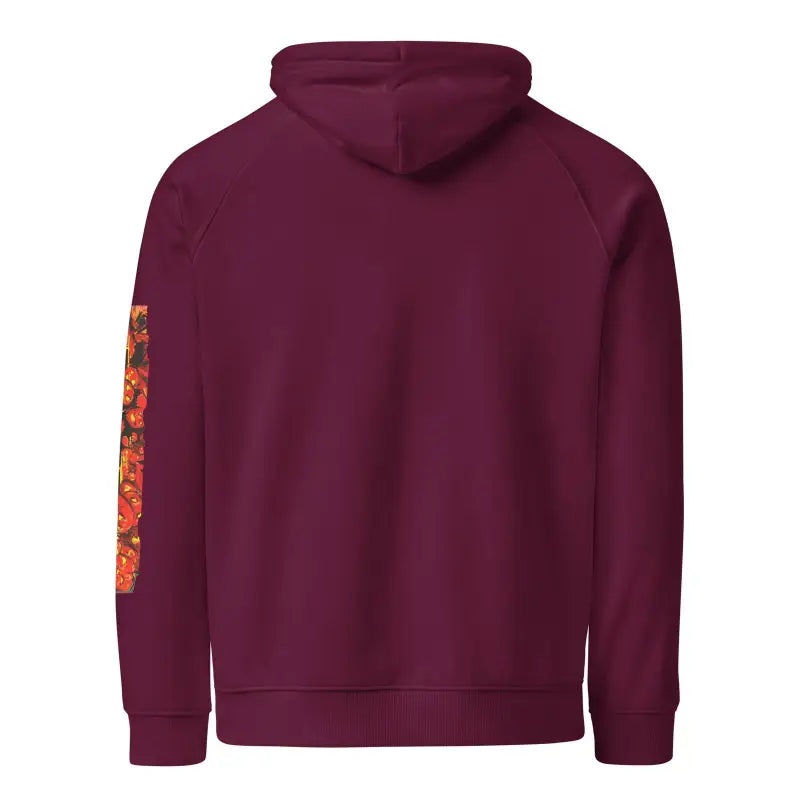 Burgundy hoodie with orange patterned sleeves featuring Matthew Dye Art for Halloween charm