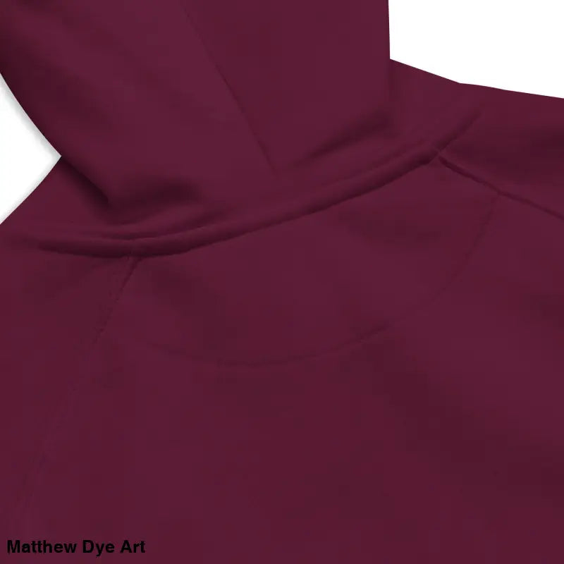 Maroon hooded sweatshirt featuring glowing green eyes in a Gothic werewolf design