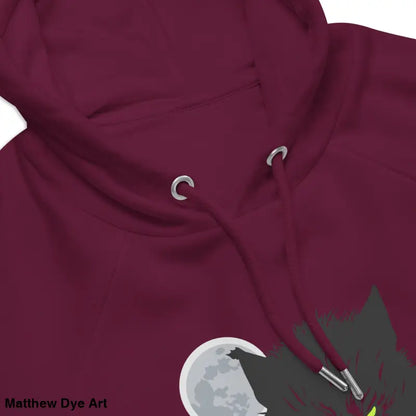 Maroon raglan hoodie featuring a wolf design with glowing green eyes for eco-friendly style