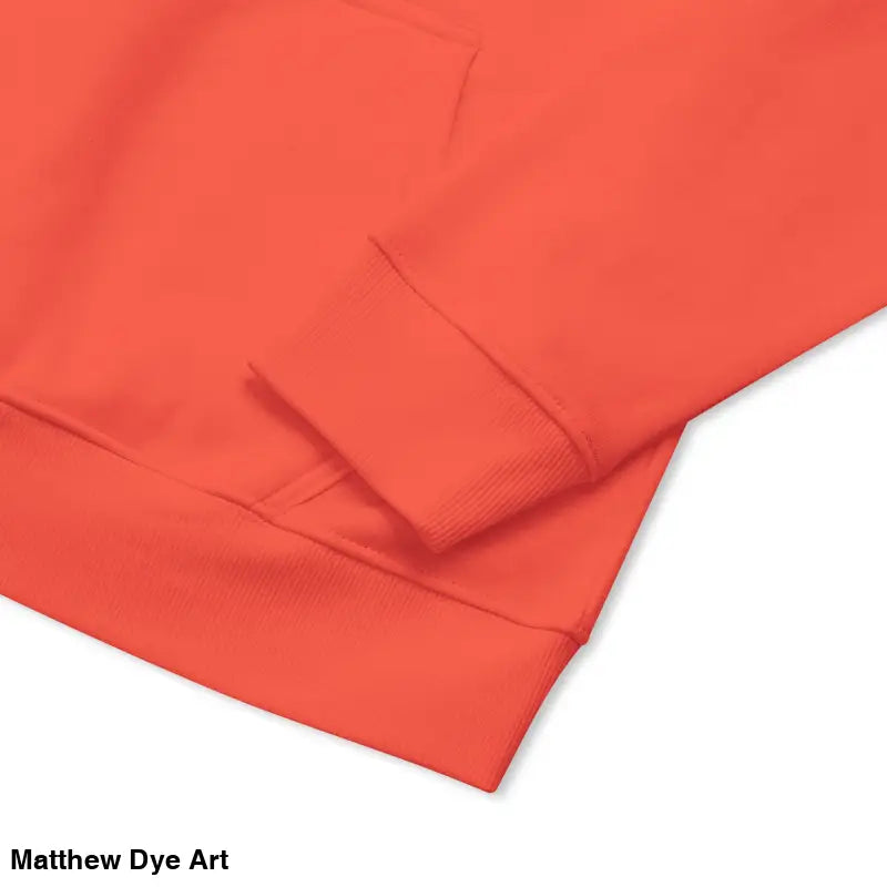 Orange raglan hoodie sleeve featuring glowing green eyes design for Howl at the Moon
