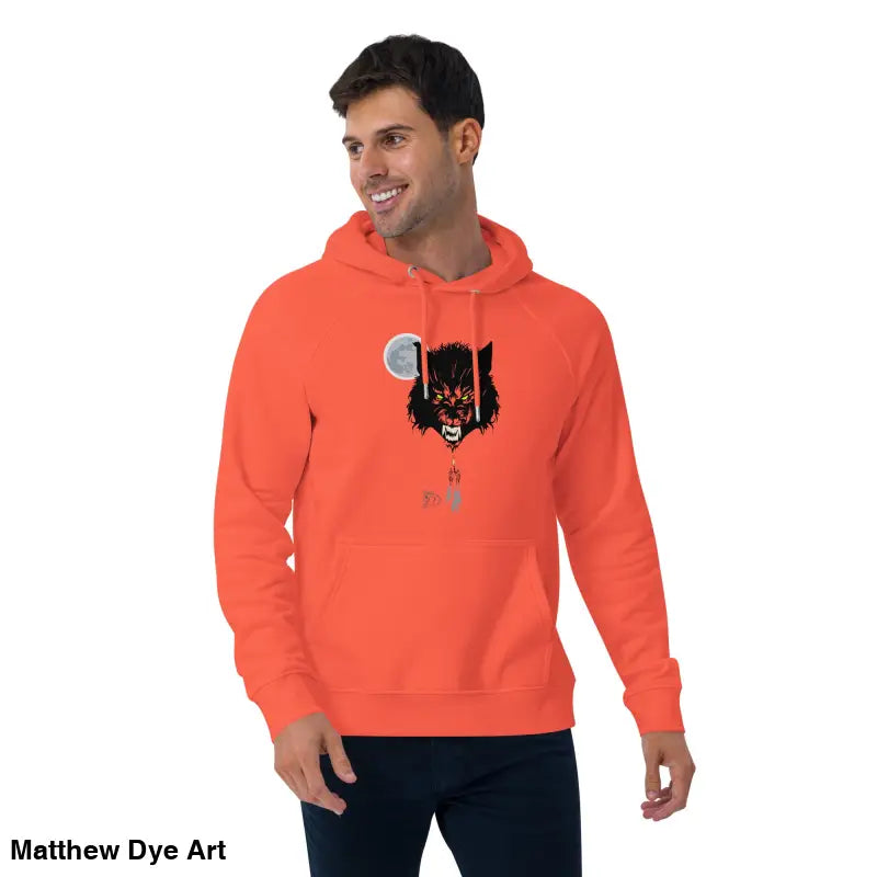 Orange raglan hoodie featuring a werewolf graphic with glowing green eyes