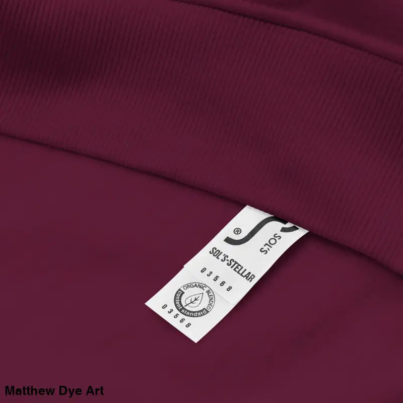 Burgundy raglan hoodie with white tag featuring glowing green eyes design for eco-friendly style