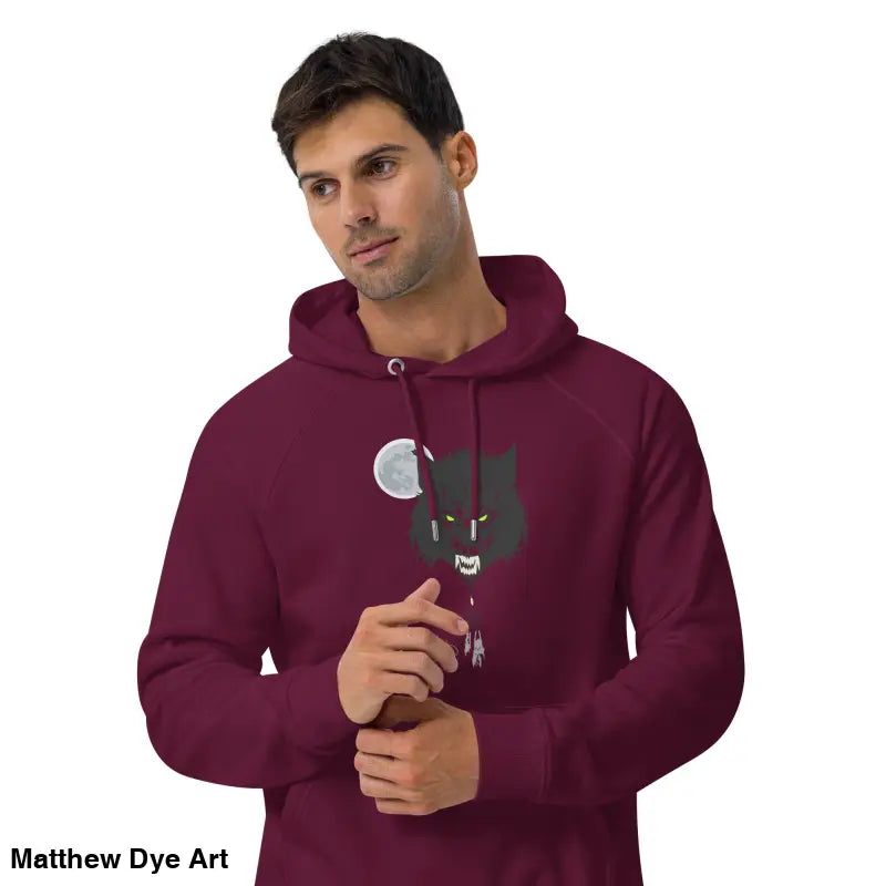 Maroon raglan hoodie featuring werewolf graphic with glowing green eyes for eco-friendly style