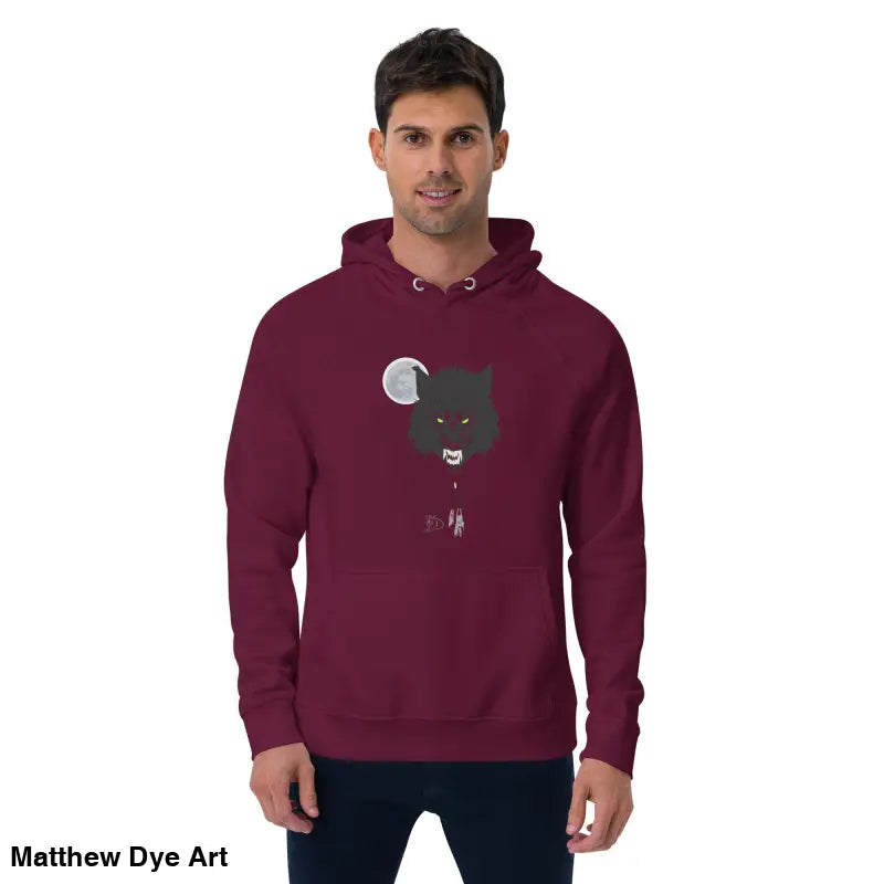 Maroon raglan hoodie featuring werewolf graphic with glowing green eyes and candlelit hands