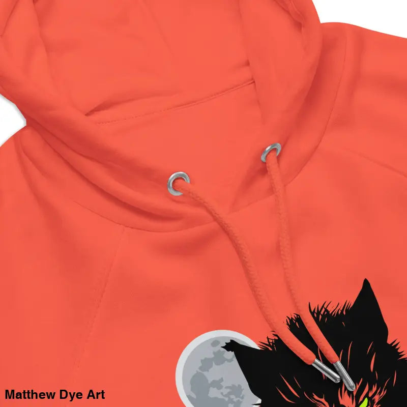 Orange raglan hoodie featuring wolf design with glowing green eyes and candlelit hands