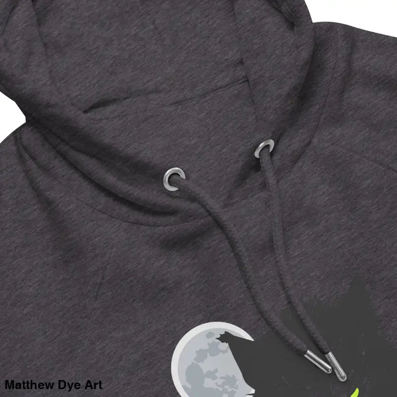 Gray hooded sweatshirt featuring glowing green eyes in Howl at the Moon design