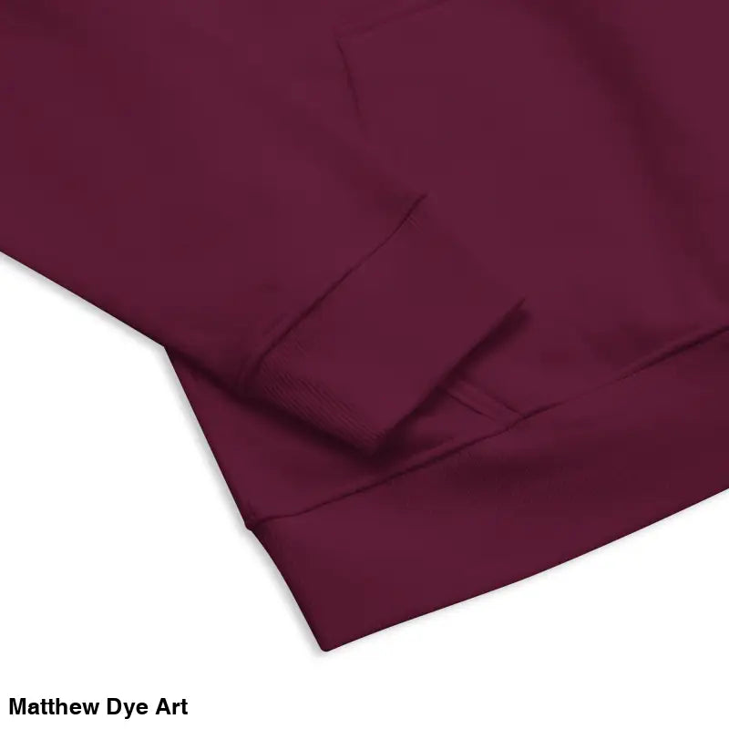 Burgundy raglan hoodie showcasing candlelit hands and glowing green eyes details