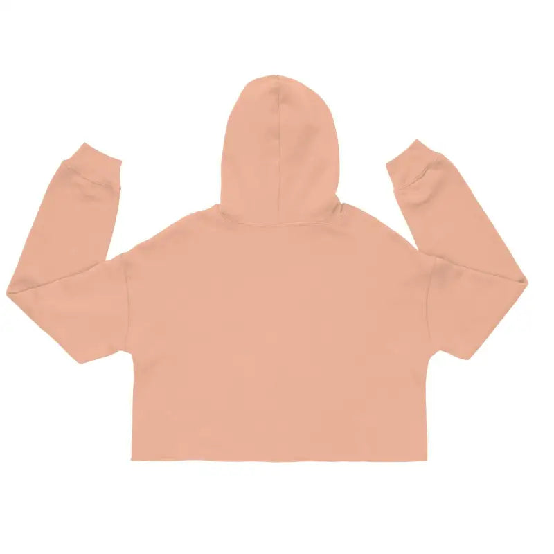 Peach-colored cropped hoodie, a captivating statement piece with raw hem whispers rebellious elegance