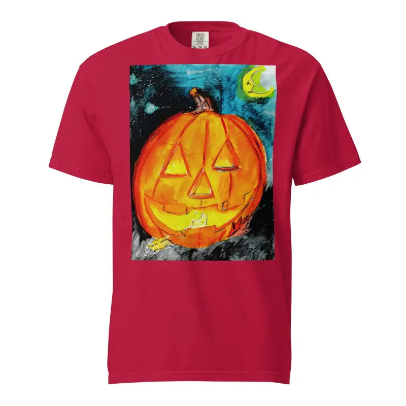 Red t-shirt featuring Matthew Dye art of a glowing jack-o’-lantern playful hauntingly design