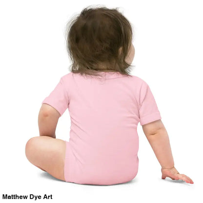 Baby in pink onesie featuring adorable jack-o’-lantern design made of combed ring-spun cotton
