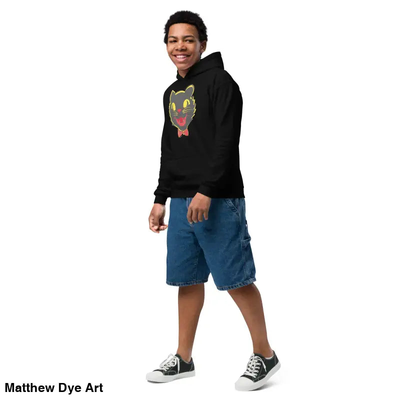 Black hoodie featuring a vintage cat graphic for youth, combining comfort entwined with style
