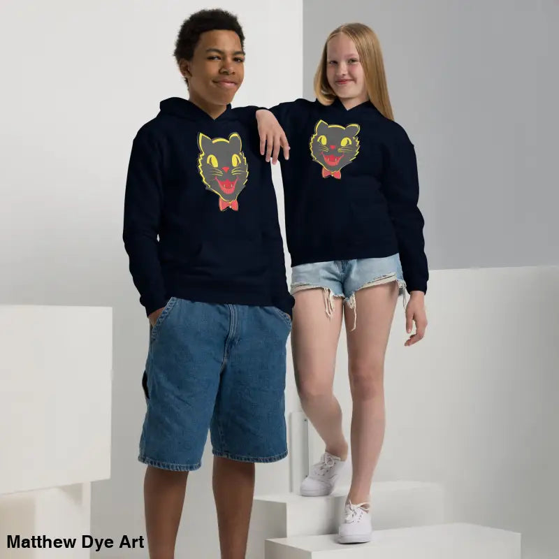 Two children in vintage cat youth hoodies, showcasing comfort entwined and playful style