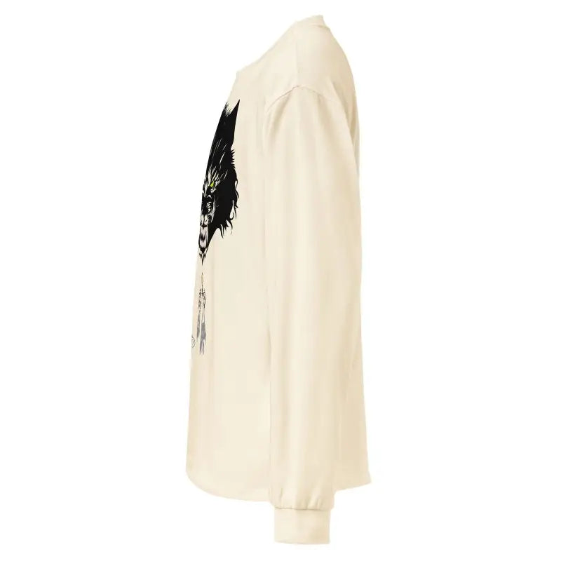 Cream-colored long sleeve shirt featuring black abstract design and glowing werewolf eyes