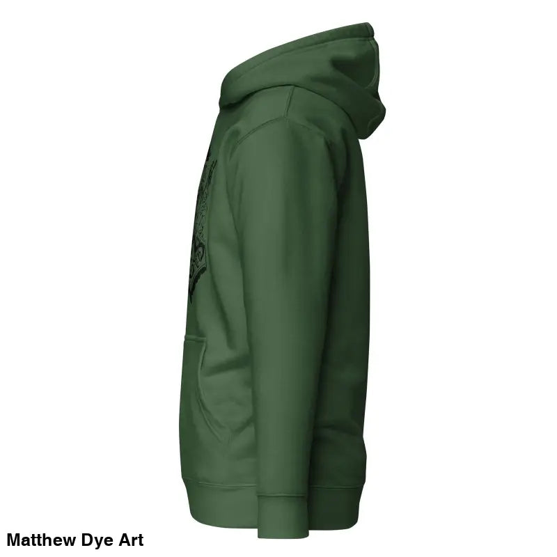 Side view of a green hooded sweatshirt featuring striking Black Mjölnir & Ravens design