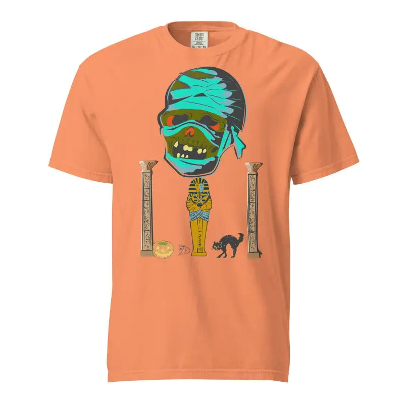 Peach-colored Mummy Unisex Heavyweight T-Shirt featuring a cartoon mummy and Egyptian columns