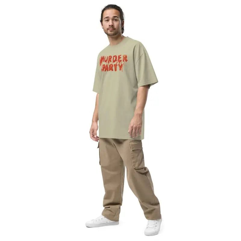 Person in beige t-shirt with red text paired with khaki cargo pants for Murder Party Mayhem