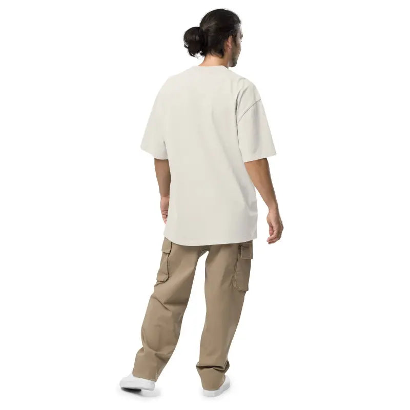 Person in white t-shirt and khaki cargo pants showcases Murder Party Mayhem style