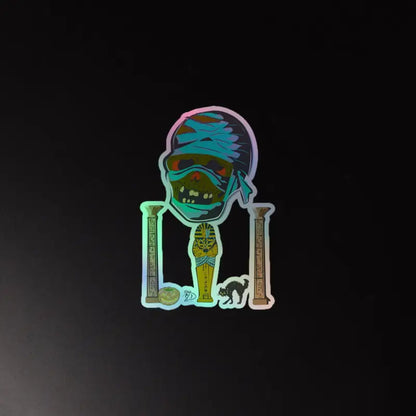 Holographic sticker of a zombie-like character with pillars, showcasing Mummy Holographic Stickers