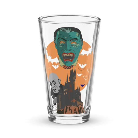 Clear shaker pint glass featuring Halloween monster artwork and flying bats design