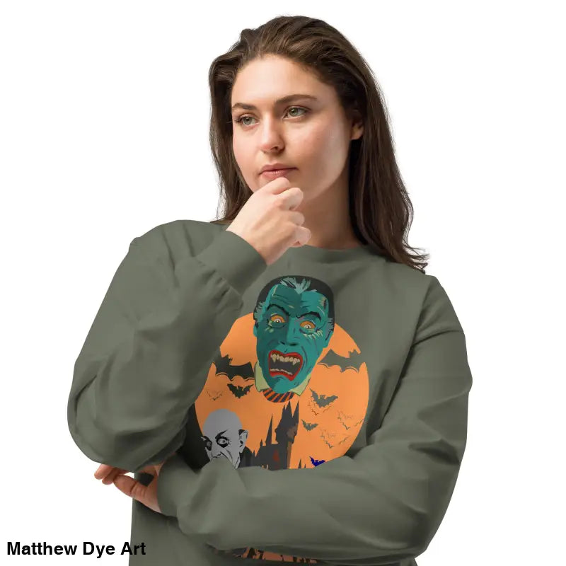 Olive green Halloween sweatshirt featuring Matthew Dye art on heavyweight long sleeve design