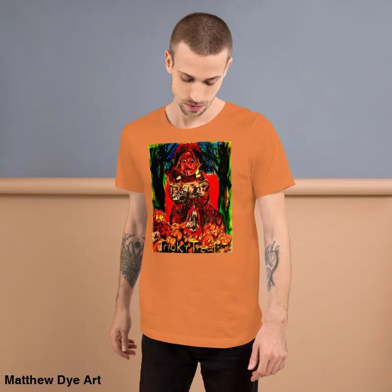 Orange t-shirt with colorful graphic from Nightmare Trickster unisex Halloween collection