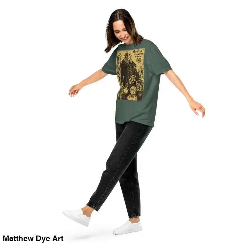 Woman modeling a Nosferatu Heavyweight T-Shirt featuring a chillingly beautiful illustration