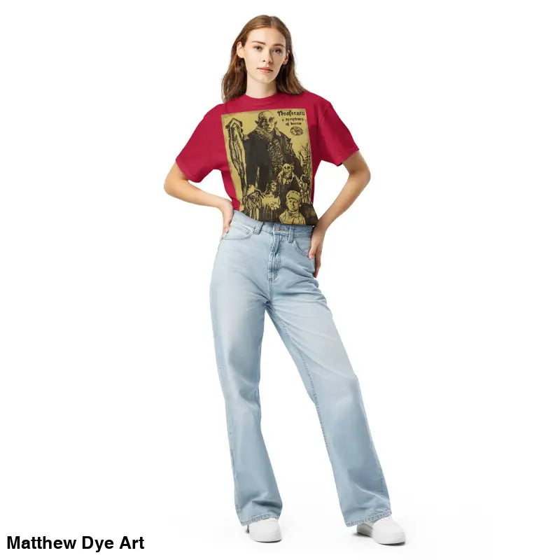Woman in graphic tee and jeans featuring chillingly beautiful Nosferatu Halloween art
