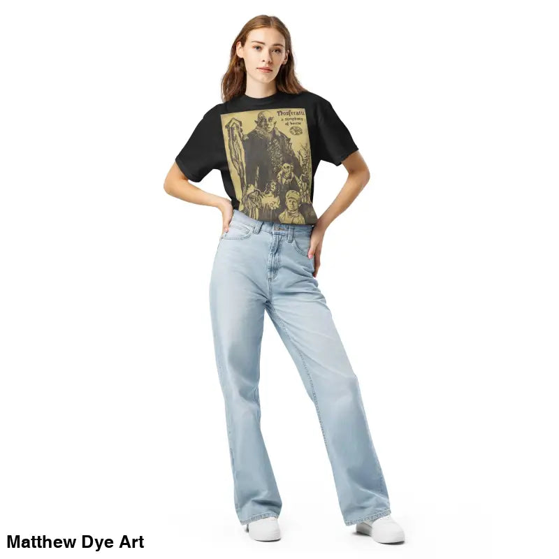 Woman in jeans and Nosferatu Heavyweight T-Shirt featuring chillingly beautiful illustration