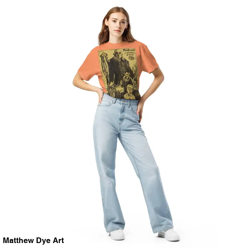 Woman in graphic tee and jeans featuring chillingly beautiful Nosferatu Halloween design