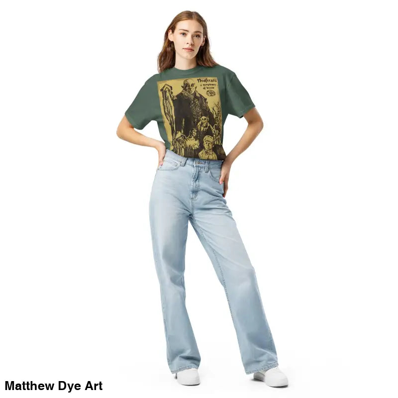 Woman showcasing the Nosferatu Heavyweight T-Shirt featuring a chillingly beautiful illustration