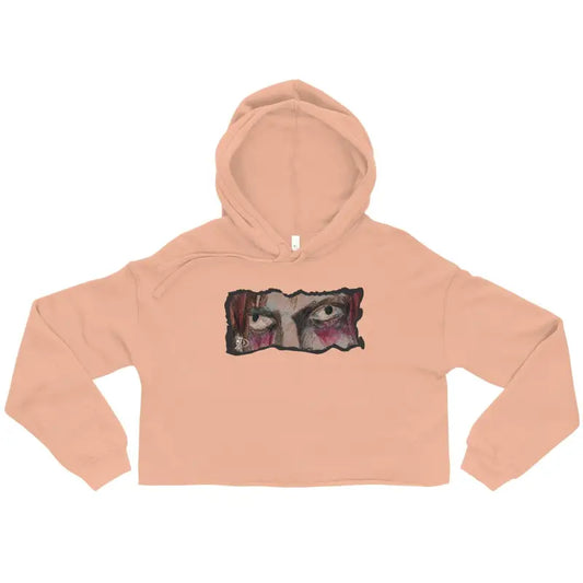 Peach-colored cropped hoodie featuring a graphic print, a remarkable statement piece for elegance