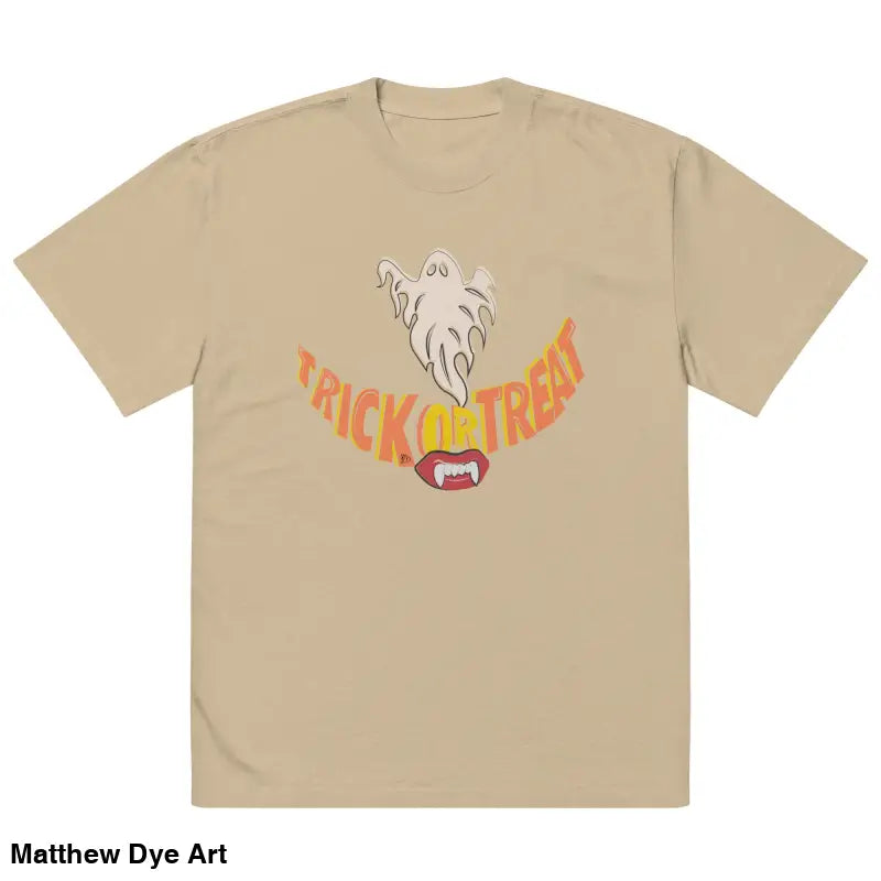 Beige oversized faded t-shirt featuring a Halloween graphic with vampire fangs