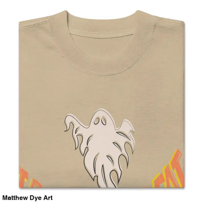 Folded tan t-shirt featuring ghost graphic from Phantoms & Fangs oversized vintage Halloween tee