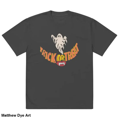 Gray oversized faded t-shirt featuring Halloween graphic with vampire fangs and treat smiles