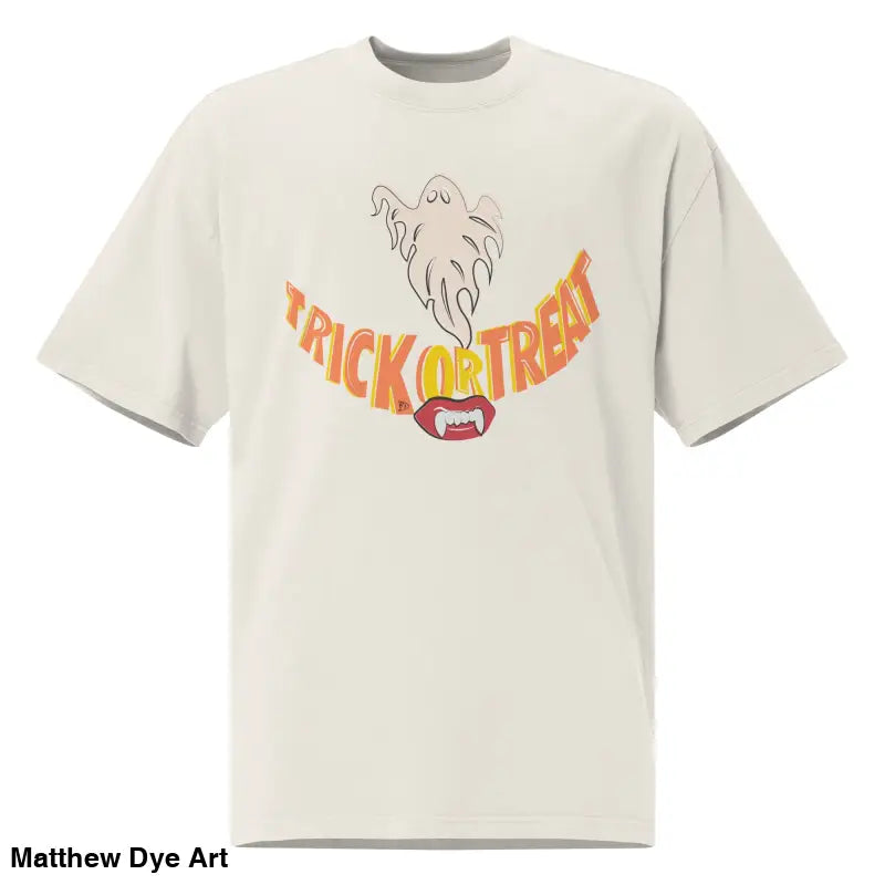 Off-white oversized faded t-shirt featuring a Halloween graphic with vampire fangs