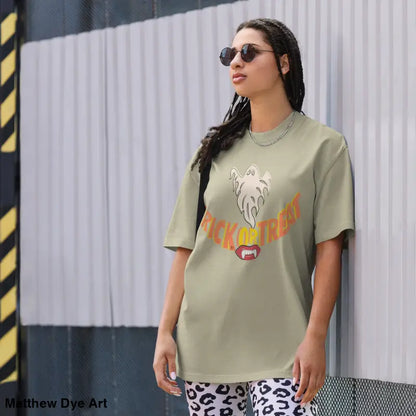 Woman’s oversized faded t-shirt featuring vampire fangs for Halloween treat smiles