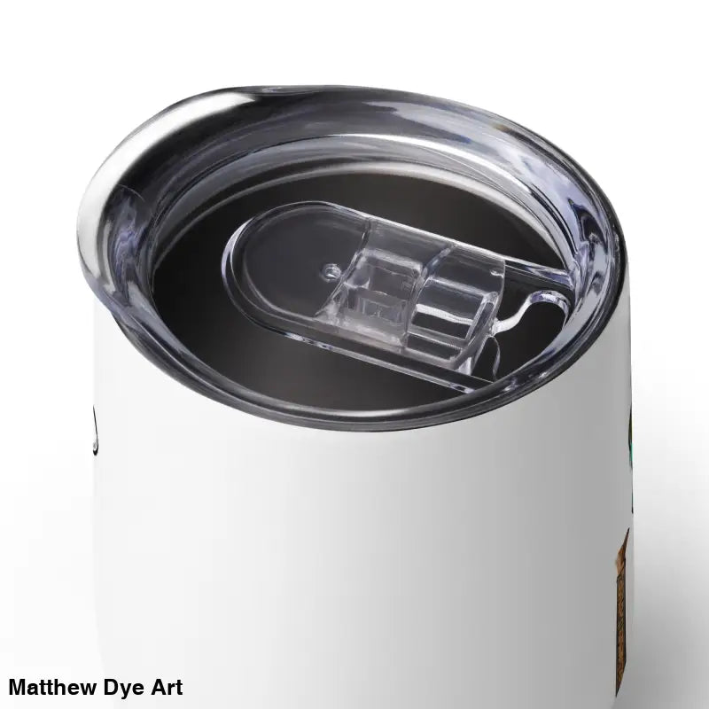 Insulated tumbler with clear lid, featuring Matthew Dye art from the enchanting realm